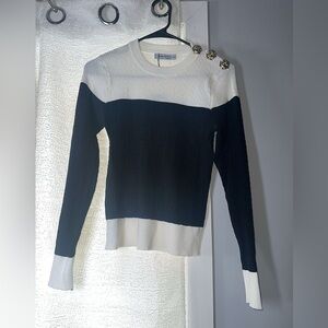 Chic Black and White Sweater with Button Accents